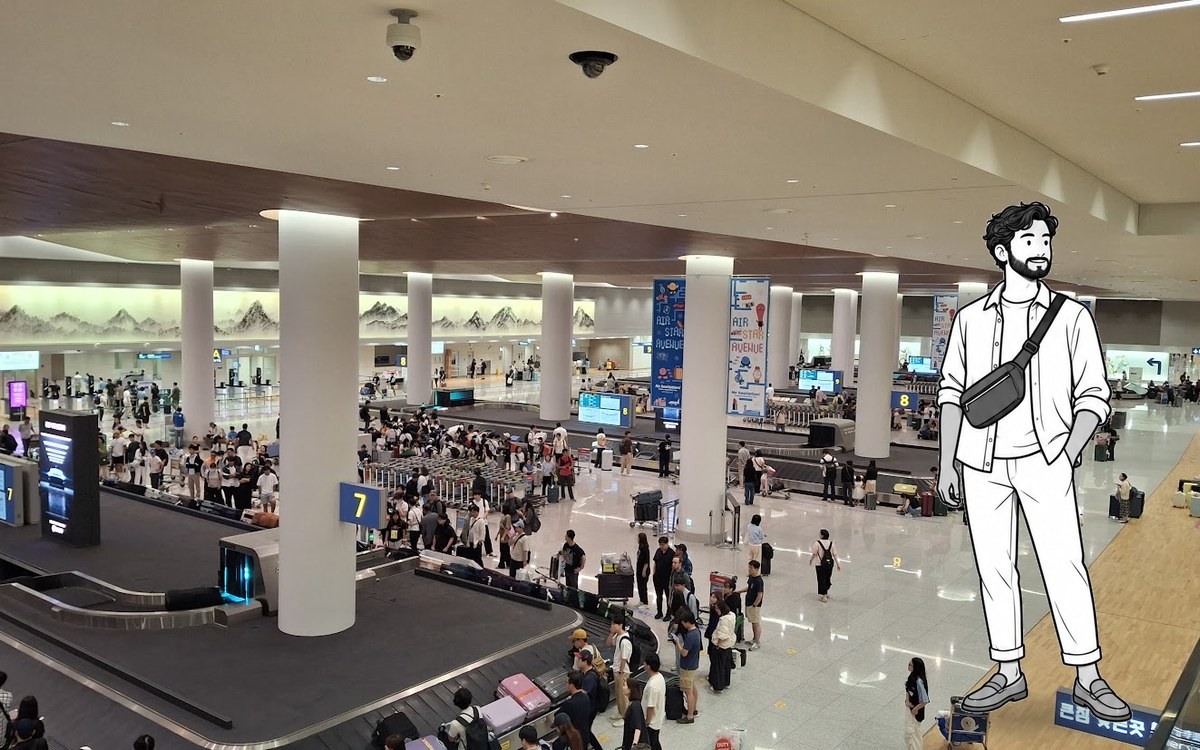 Traveler checking a suitcase at the Incheon Airport baggage carousel before purchasing transport