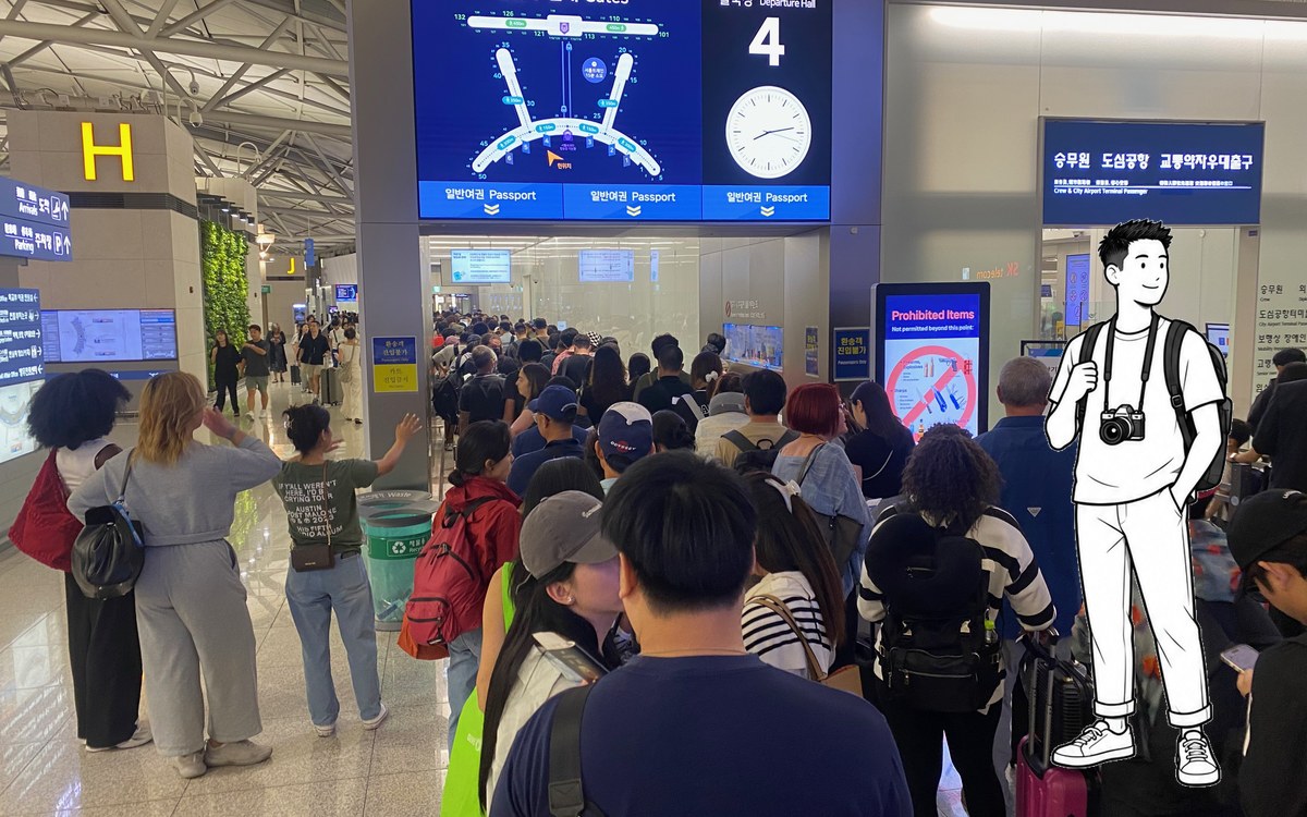 Traveler with a camera testing mobile data near an Incheon Airport telecom counter